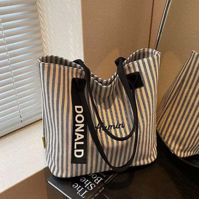 条纹大容量帆布包包女2025新款时尚手提单肩购物袋休闲通勤托特包