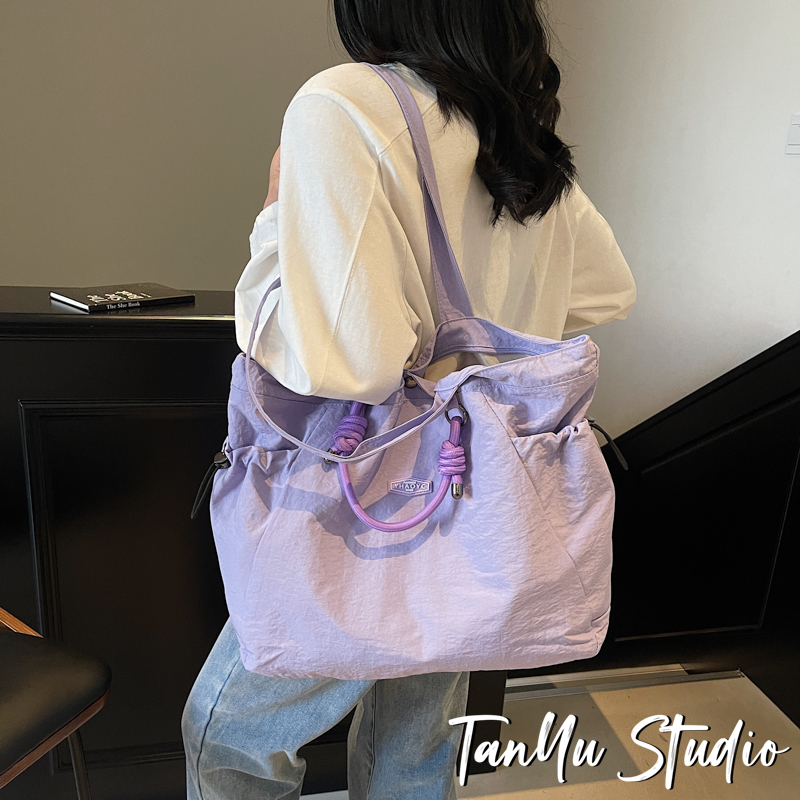 探屿潮牌2025超火托特包女大容量包包通勤单肩布包轻便休闲旅行包