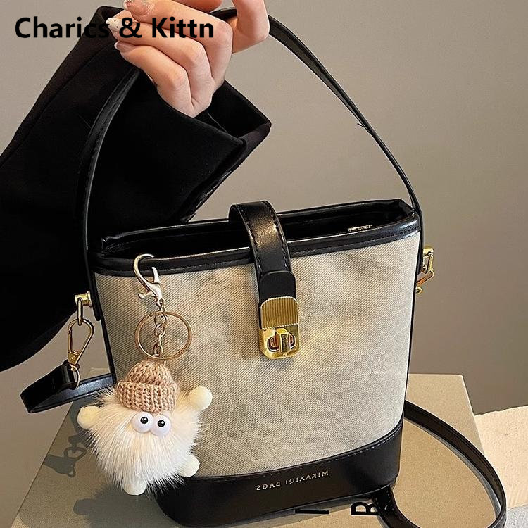 Charics&Kittn包包女2025新款小众高级单肩斜挎包真皮手提水桶包