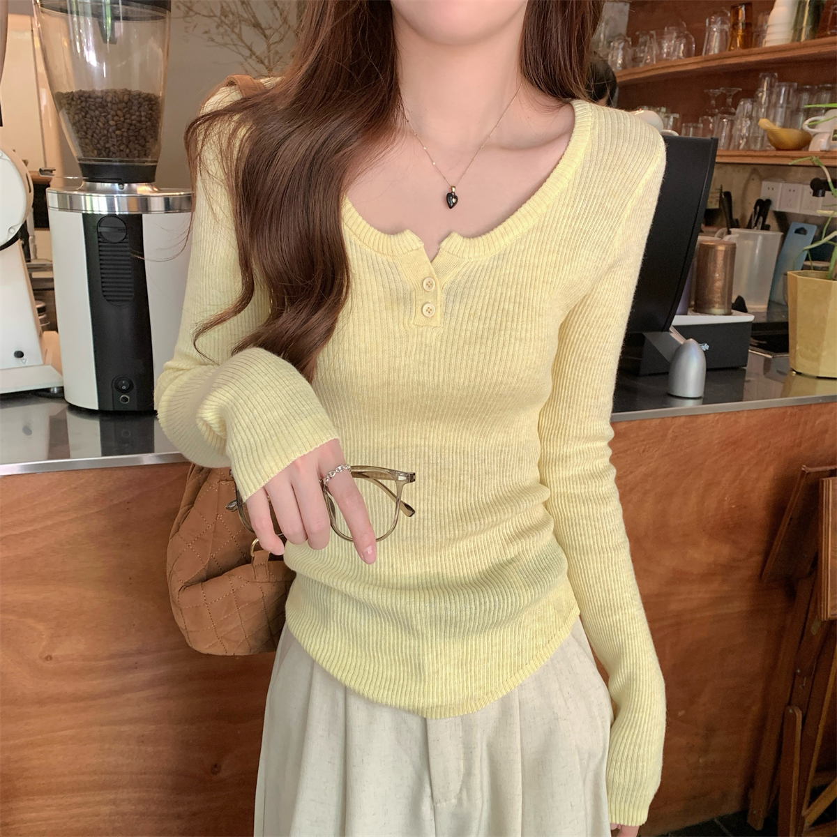 鹅黄色显白半开领针织打底衫女2025初春纽扣气质显瘦长袖上衣毛衣