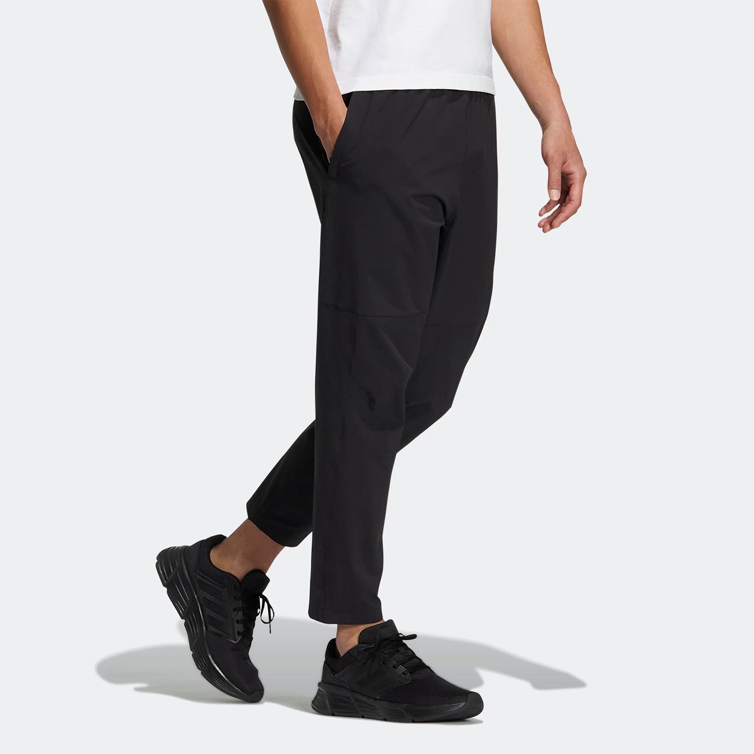 Adidas/阿迪达斯纯色休闲健身训练梭织男款透气运动长裤 HM2970