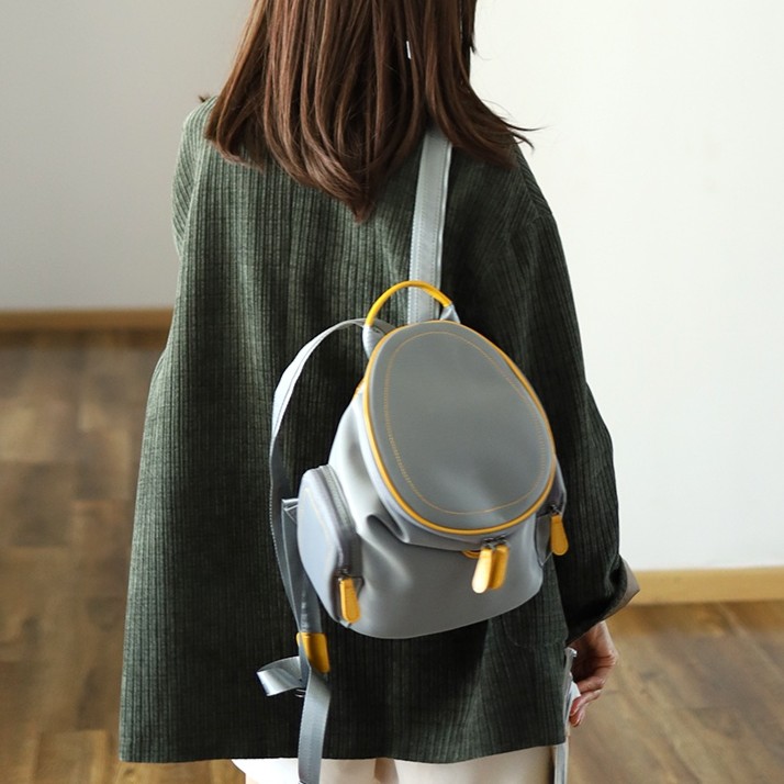 小众质感双肩包细腻尼龙水桶背包女2025新款潮高级感帆布轻便书包